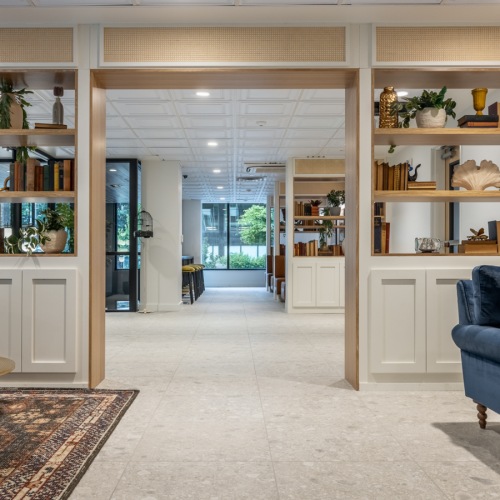 Re-Imagined Apartment Living coworking space with chairs and booths