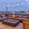 Wayfarer rooftop terrace with seating and string lights - Seattle, WA